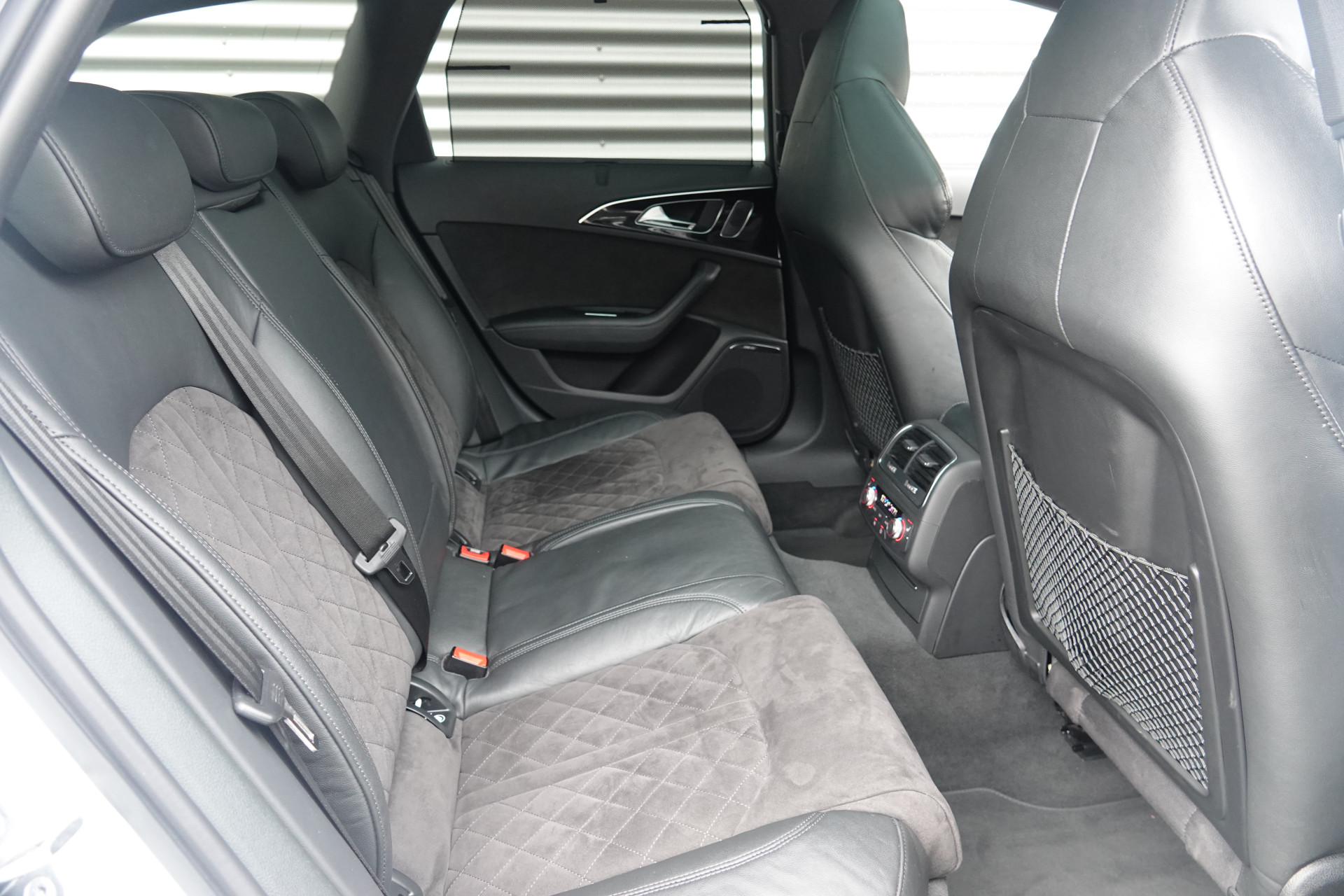 tweedehands Audi A6 Avant 4.0 TFSI RS 6 quattro Pro Line Plus | Pano | Bose | Akrapovic | Mat | Soft Close | Memory | ACC |  – beschikbaar bij Van de Velde Auto’s