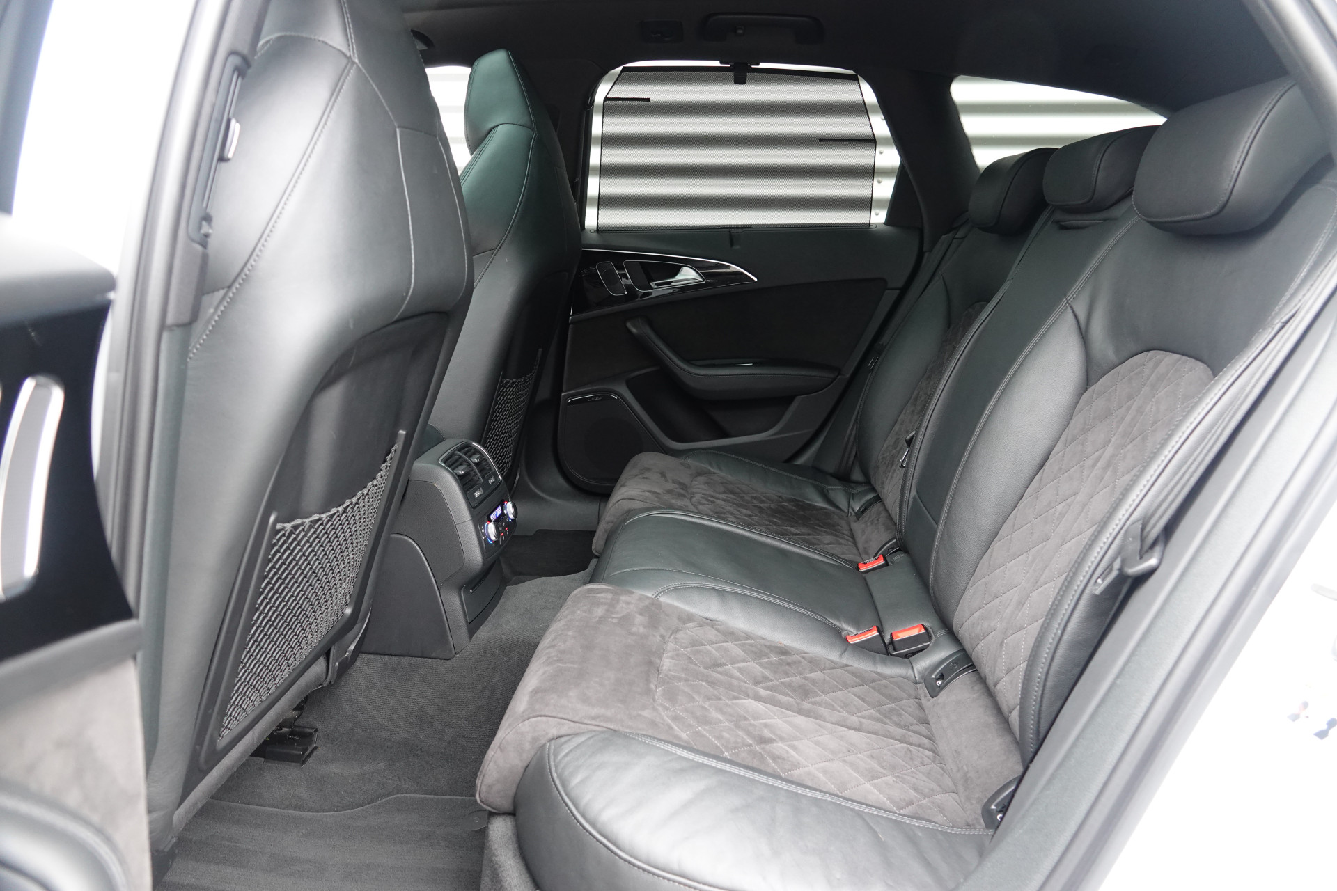 tweedehands Audi A6 Avant 4.0 TFSI RS 6 quattro Pro Line Plus | Pano | Bose | Akrapovic | Mat | Soft Close | Memory | ACC |  – beschikbaar bij Van de Velde Auto’s