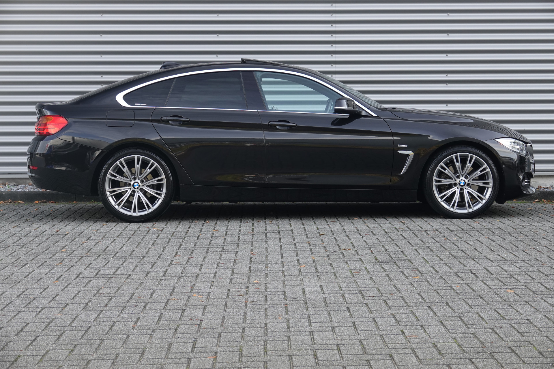 tweedehands BMW 4 Serie Gran Coupé 430i Centennial High Executive | Schuif-Kanteldak | HUD | Memory | H&K | Keyless | 360 |  – beschikbaar bij Van de Velde Auto’s