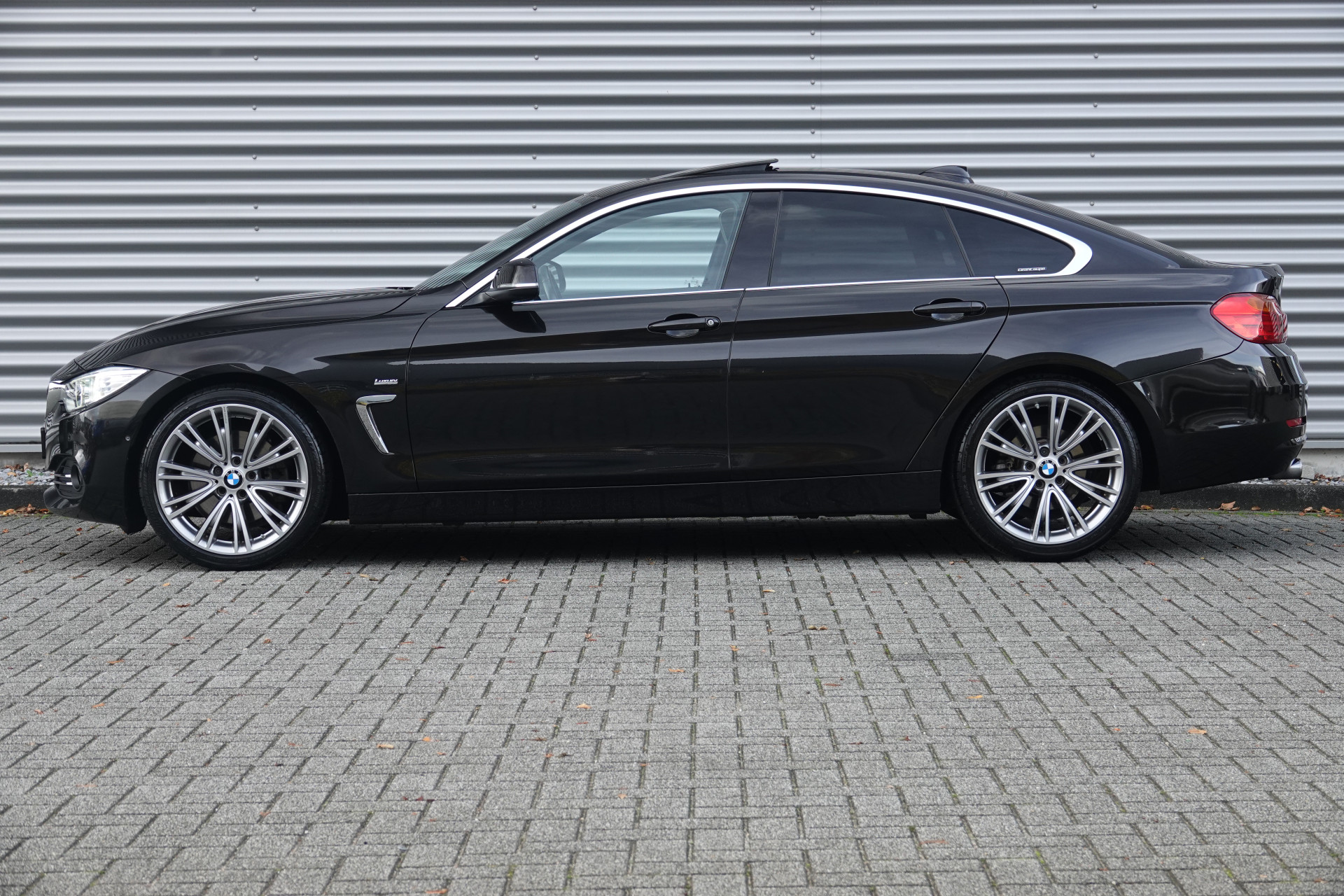 tweedehands BMW 4 Serie Gran Coupé 430i Centennial High Executive | Schuif-Kanteldak | HUD | Memory | H&K | Keyless | 360 |  – beschikbaar bij Van de Velde Auto’s